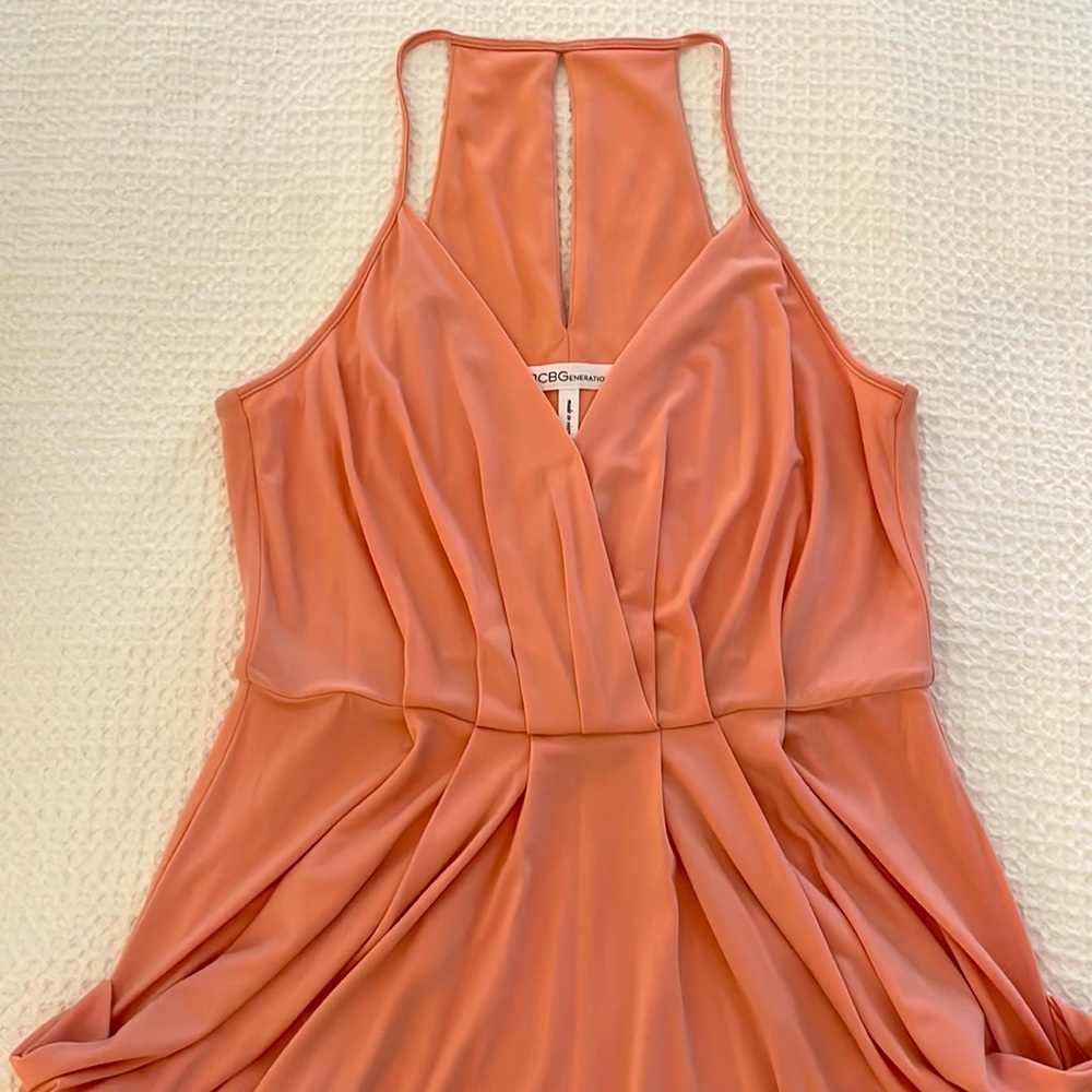 BCBGeneration woman’s faux wrap coral/peach midi dress; size M